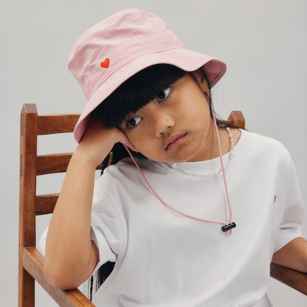 
                      
                        NYLON HEART BUCKET HAT - SHELL PINK
                      
                    