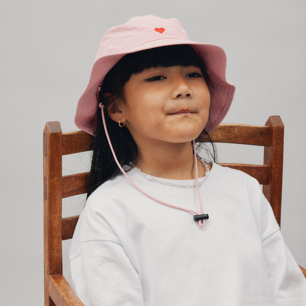 
                      
                        NYLON HEART BUCKET HAT - SHELL PINK
                      
                    