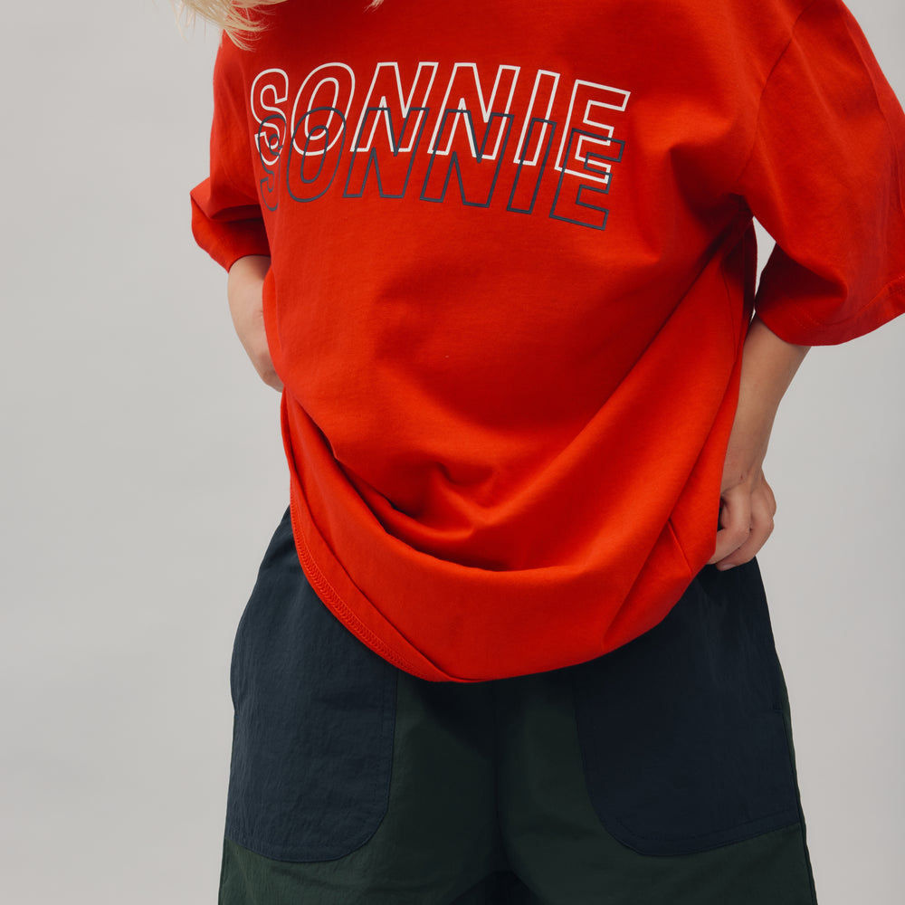 
                      
                        DOUBLE VISION TEE - TEAM RED
                      
                    