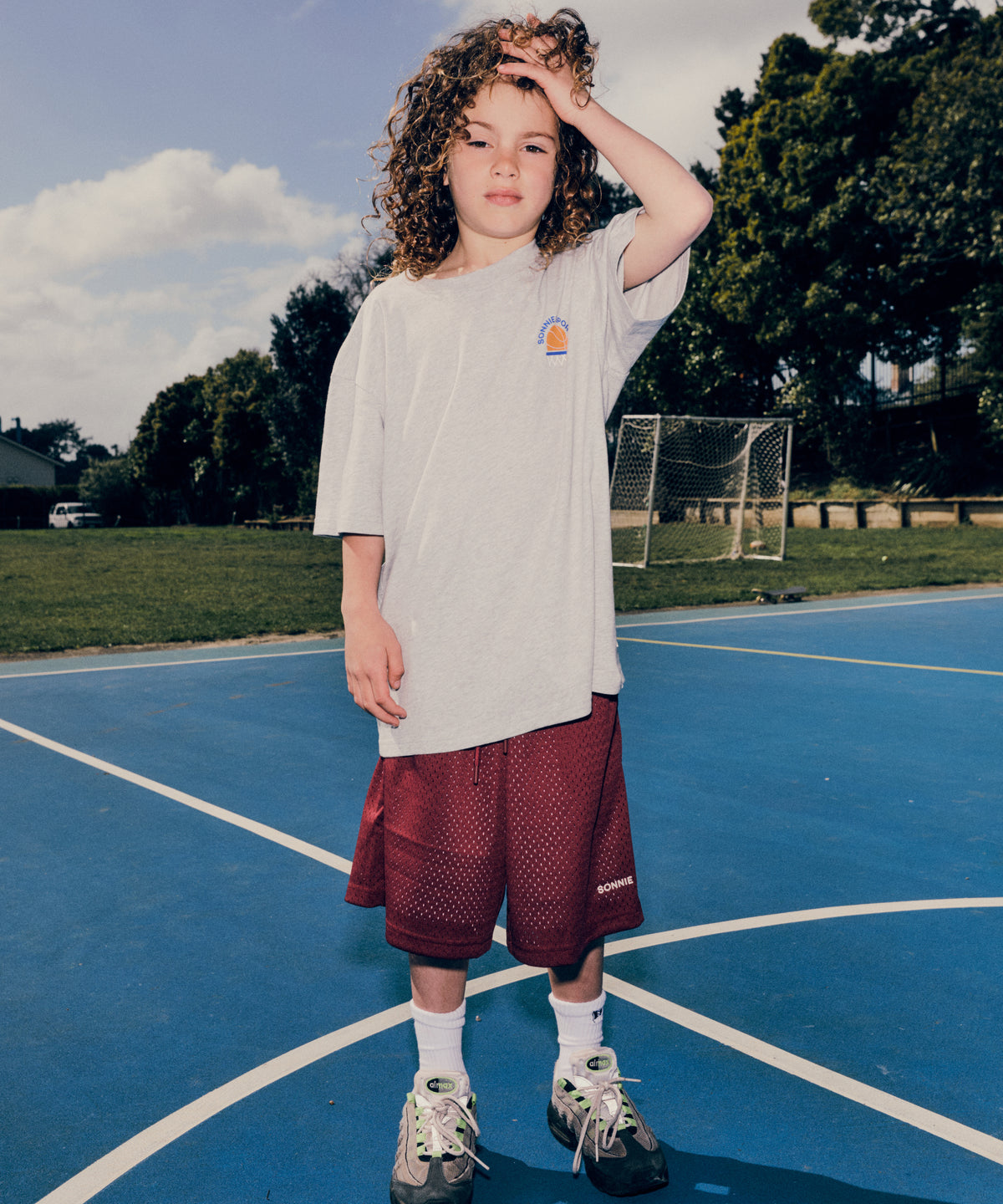 SONNIE Sports Association Tee in Grey Marle, worn