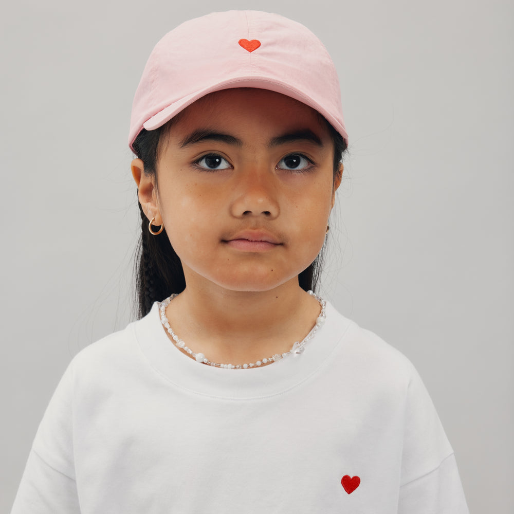 
                      
                        NYLON HEART CAP - SHELL PINK
                      
                    