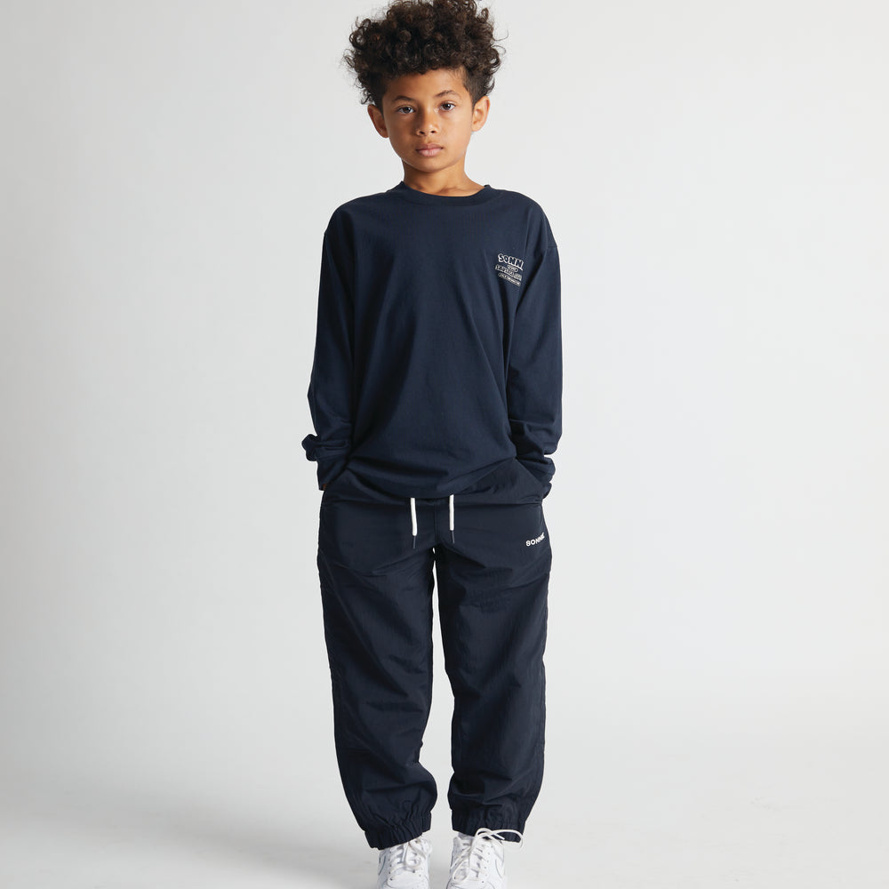 
                      
                        Nylon Sports Pants - Ink
                      
                    